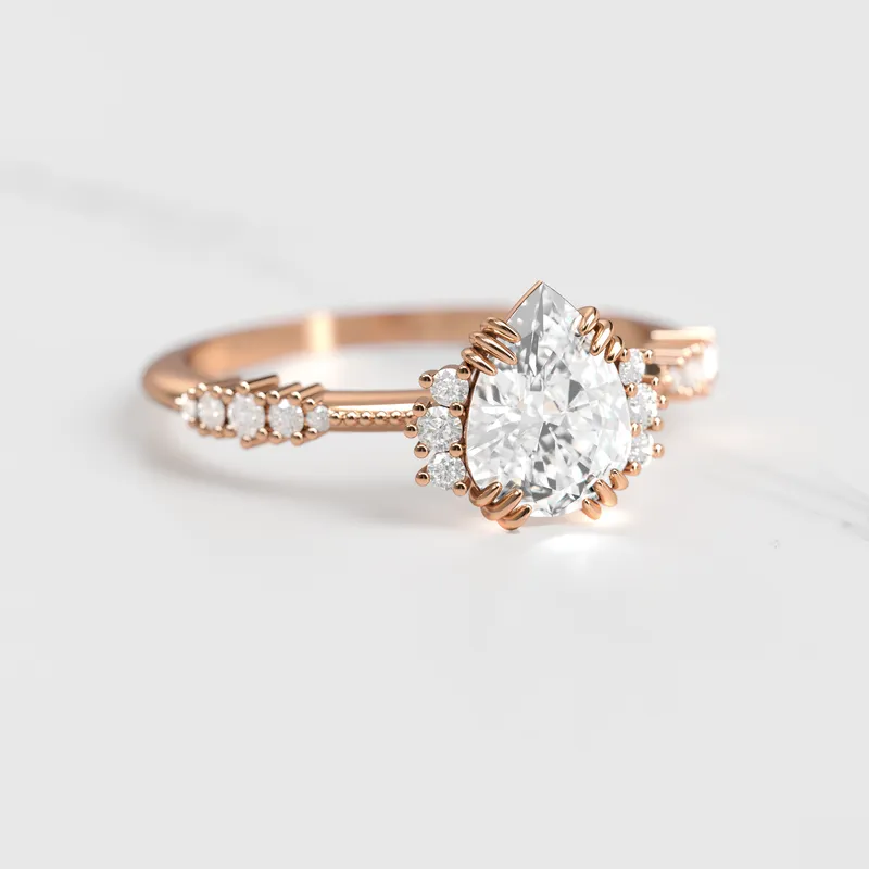 PEAR CLUSTER DIAMOND RING vy 2