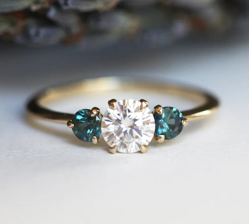 Paloma Moissanite And Teal Sapphire Engagement Ring round cut engagement ring