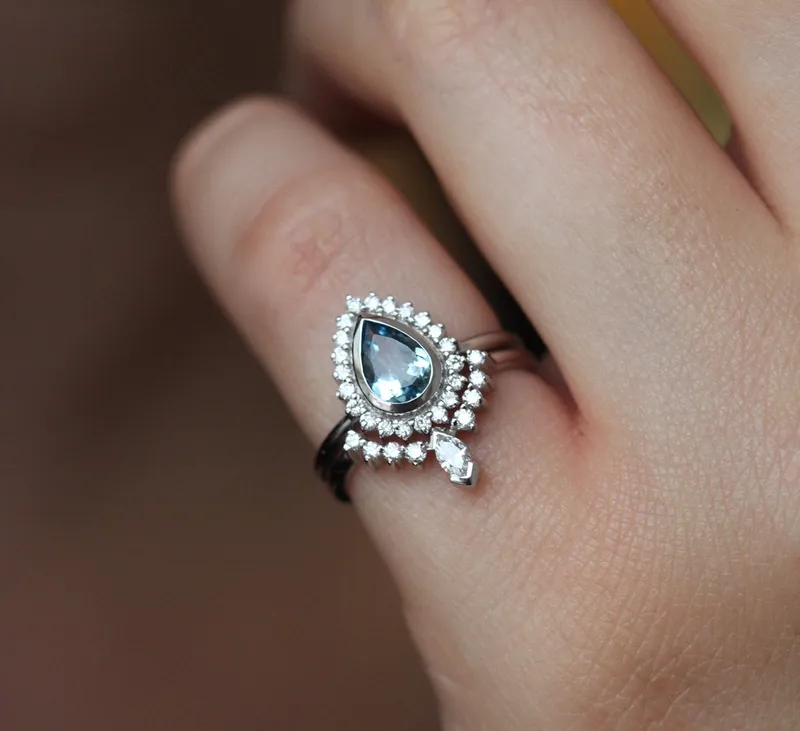 PEAR-CUT AQUAMARINE RING SET WITH DIAMOND HALO AND MARQUISE BAND view 10