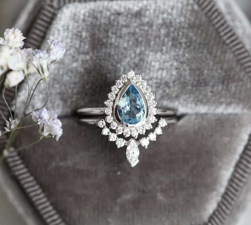 PEAR-CUT AQUAMARINE RING SET WITH DIAMOND HALO AND MARQUISE BAND view 2