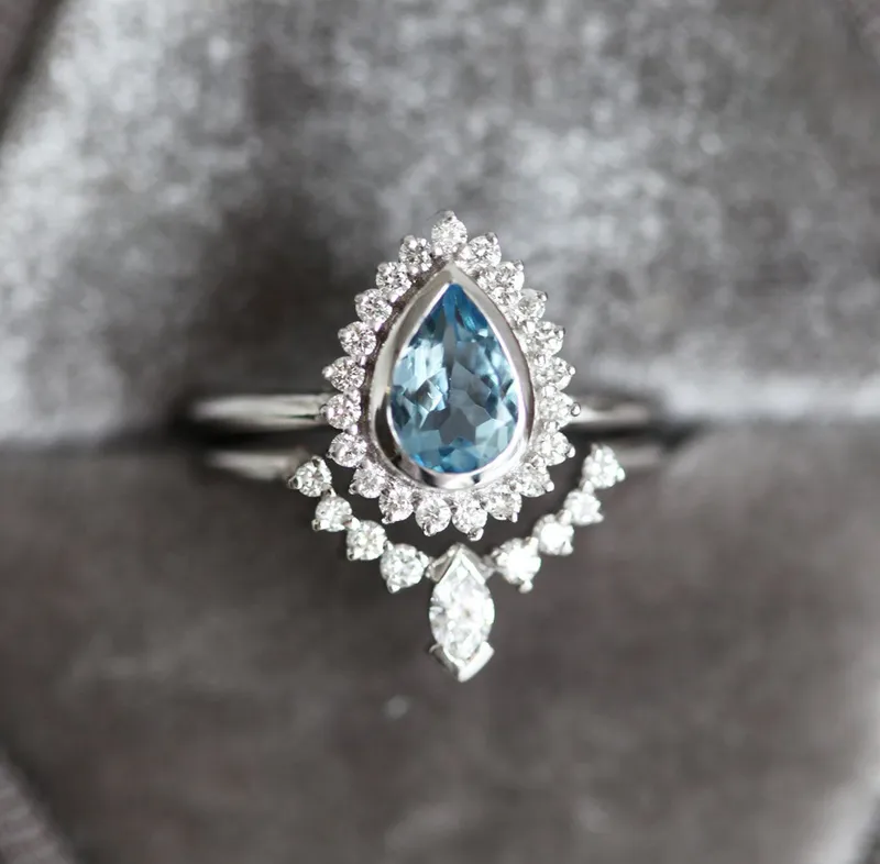 PEAR-CUT AQUAMARINE RING SET WITH DIAMOND HALO AND MARQUISE BAND view 3