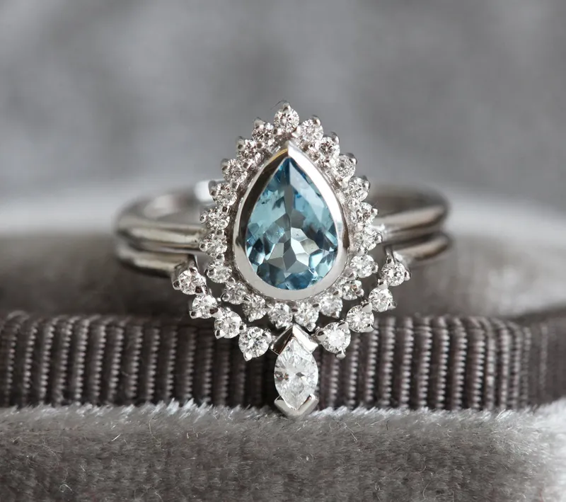 PEAR-CUT AQUAMARINE RING SET WITH DIAMOND HALO AND MARQUISE BAND view 4