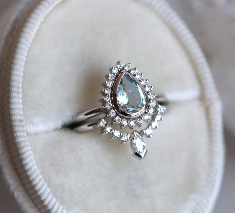 PEAR-CUT AQUAMARINE RING SET WITH DIAMOND HALO AND MARQUISE BAND view 5