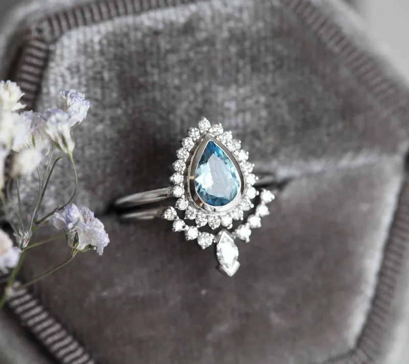 PEAR-CUT AQUAMARINE RING SET WITH DIAMOND HALO AND MARQUISE BAND view 7
