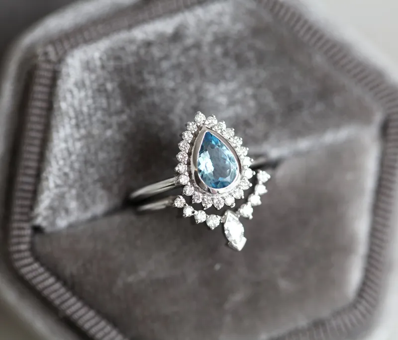 PEAR-CUT AQUAMARINE RING SET WITH DIAMOND HALO AND MARQUISE BAND view 8