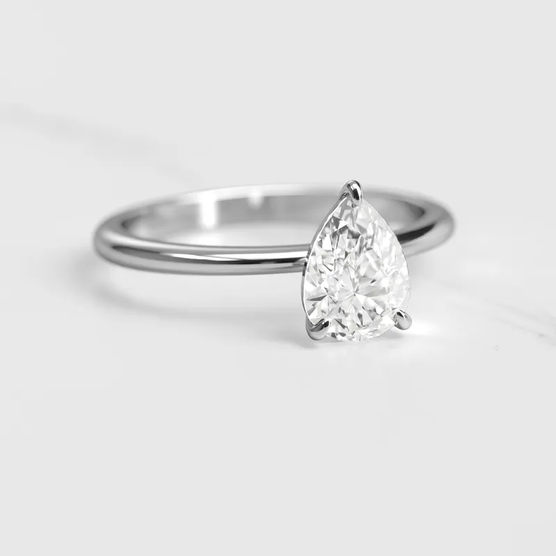Pear Tapered Solitaire Diamond Ring vy 3