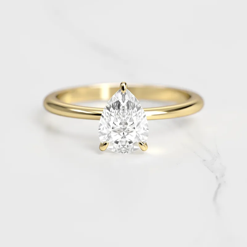 Pear Tapered Solitaire Diamond Ring vy 4