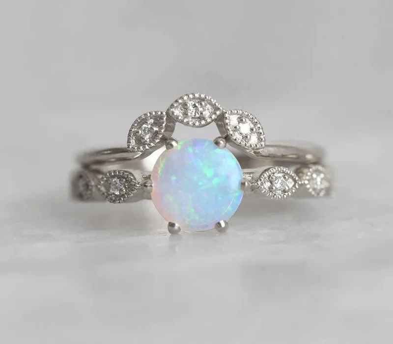 ROUND OPAL RING WITH DIAMOND PAVE BAND AND MATCHING RING view 11