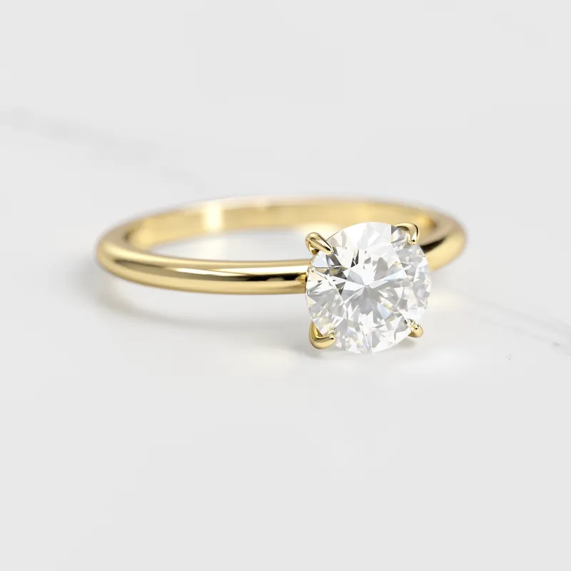 Round Tapered Solitaire Diamond Ring round cut engagement ring