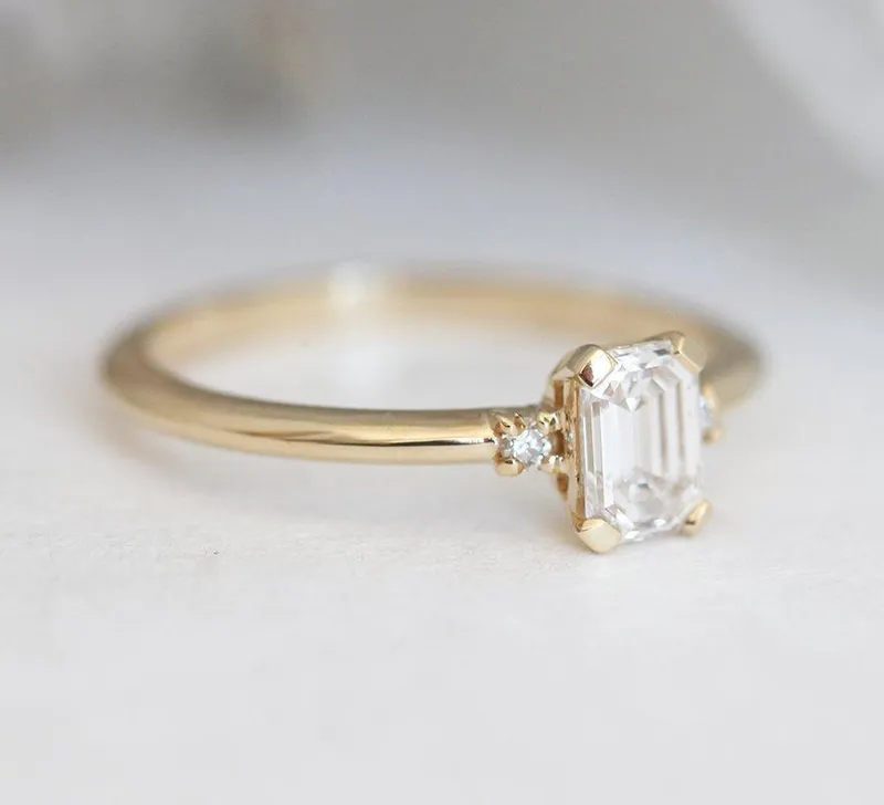 Sleek & Simple Emerald-Cut Diamond Ring With Side Diamonds view 2