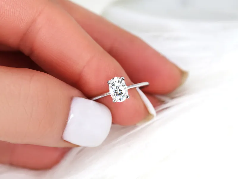 1ct Skinny Rhonda 7x5mm 14kt Gold Moissanite Dainty Oval Solitaire Ring vy 2