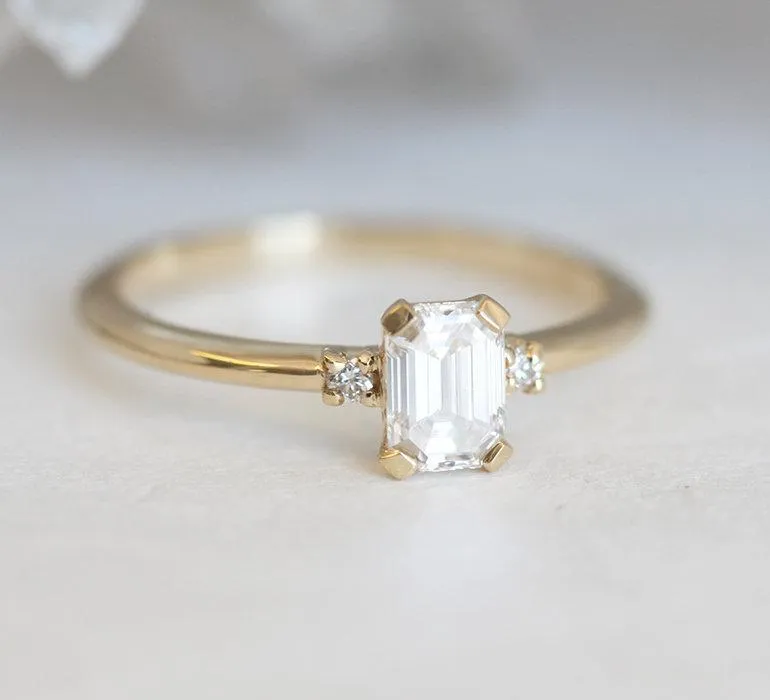Sleek & Simple Emerald-Cut Diamond Ring With Side Diamonds view 4