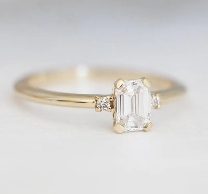 Sleek & Simple Emerald-Cut Diamond Ring With Side Diamonds view 5