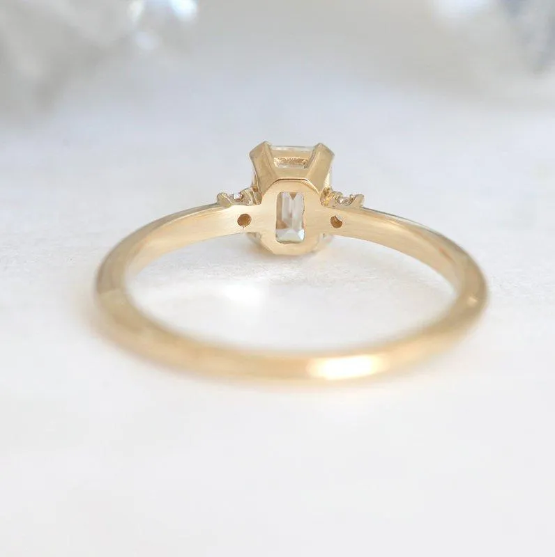 Sleek & Simple Emerald-Cut Diamond Ring With Side Diamonds view 6