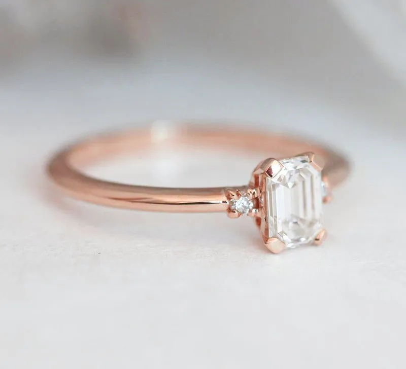 Sleek & Simple Emerald-Cut Diamond Ring With Side Diamonds view 8