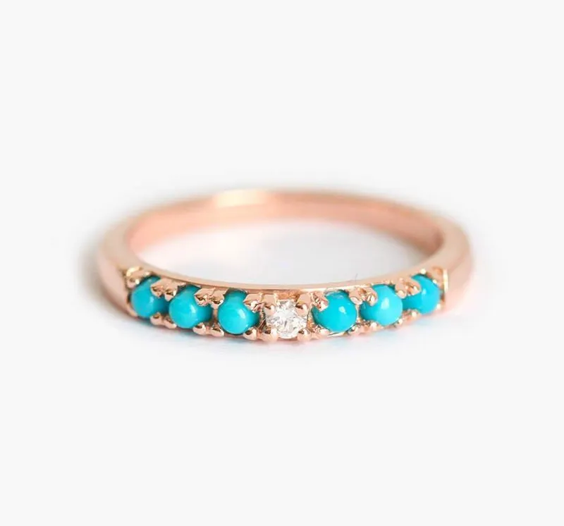 Turquoise Gold Ring With Centerpiece Diamond diamond round cut engagement ring