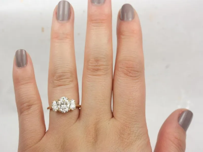 2cts Odessa 9x7mm 14kt Gold Moissanite Dainty 3 Stone Oval Engagement Ring view 6