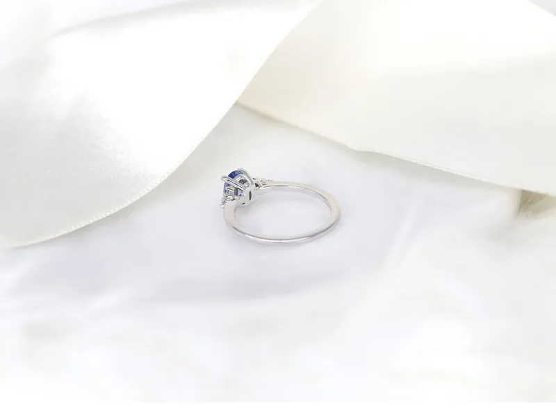 1.04ct Ready to Ship Maddy 14kt White Gold Cornflower Sapphire Diamond Oval Cluster 3 Stone Ring view 6