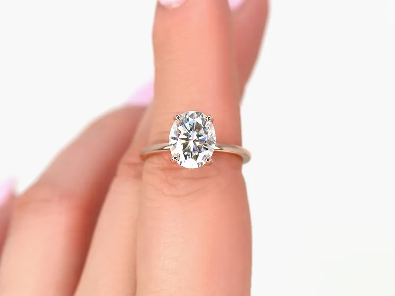 3ct Dakota 10x8mm 14kt Rose Gold Moissanite Dainty Minimalist Oval Solitaire Ring view 4