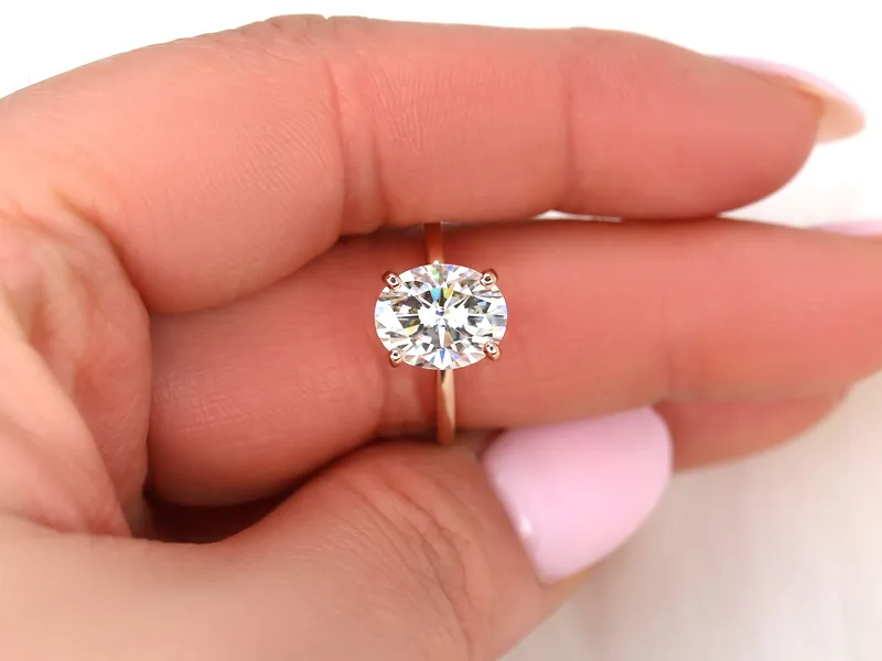 3ct Dakota 10x8mm 14kt Rose Gold Moissanite Dainty Minimalist Oval Solitaire Ring view 5