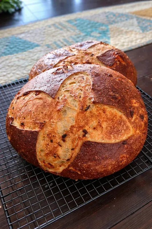 One mini sourdough cheddar pretzel loaf