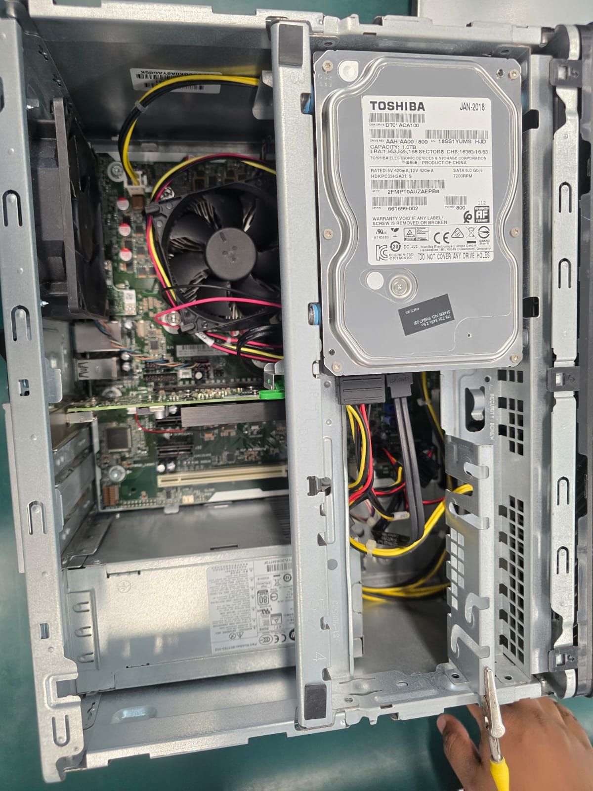 Diving Deep: My First PC Teardown and the Allure of the Unknown