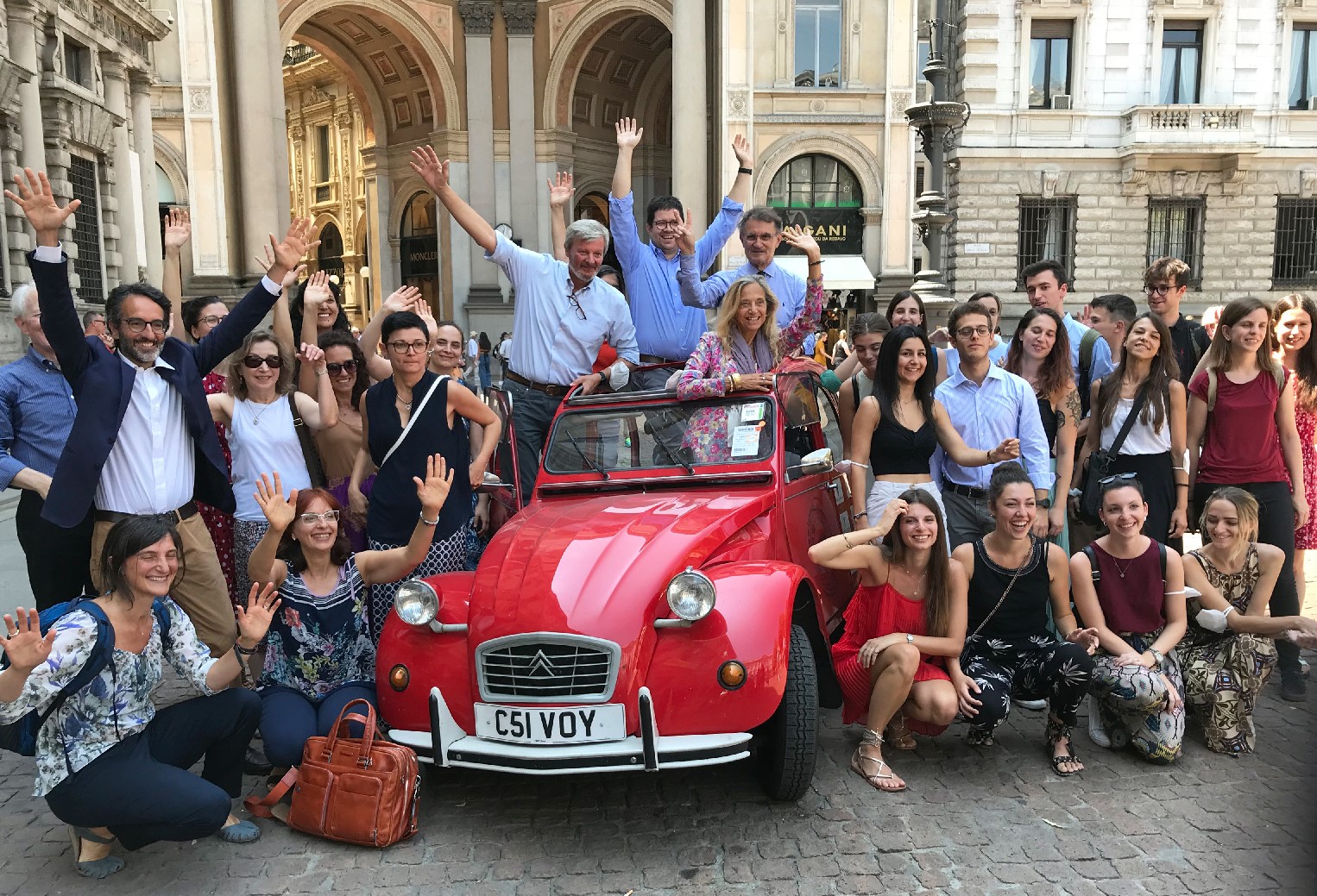 Everyone, including researchers from the Universities of Milan, Padova, and Trento, turned out to welcome the little red 2CV which had traveled so far from Los Angeles to Milan.