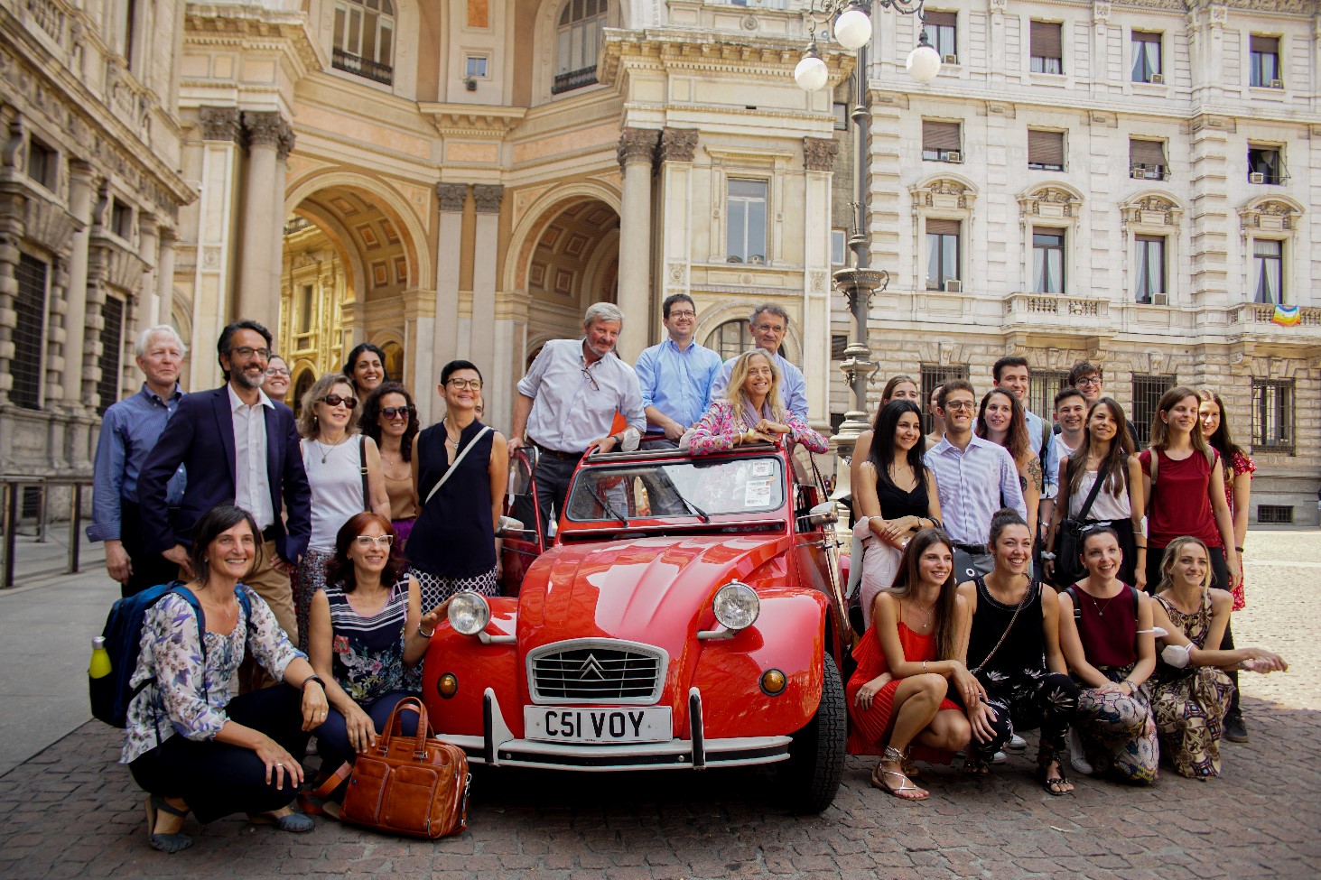 Another great photo of the little red car with so may well wishers.