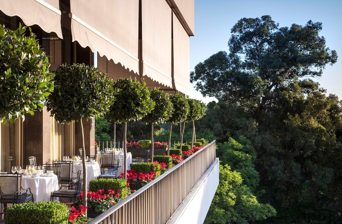 Four Seasons Hotel Ritz Lisbon — flagship 5-star urban luxury wedding venue overlooking Edward VII Park with grand ballroom, 600-piece art collection, capacity 350