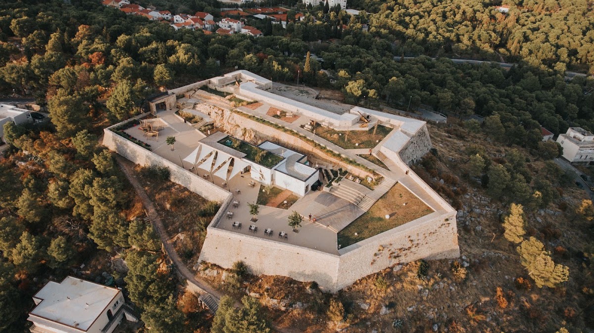Barone Fortress, Šibenik — restored 17th-century hilltop fortress terrace with panoramic views over the cathedral dome and channel, capacity for 120 guests