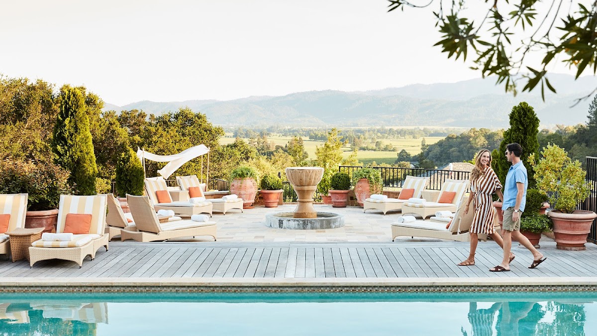 Auberge du Soleil — iconic 33-acre olive grove luxury resort on Rutherford Hill in Napa Valley with Michelin-starred restaurant, sweeping valley views, 50 suites, adults-only, capacity 120