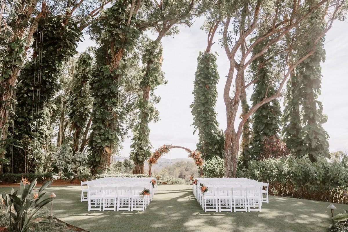 Sunset Ranch Hawaii, North Shore Oʻahu — garden ceremony site among ironwood trees on a private 30-acre estate