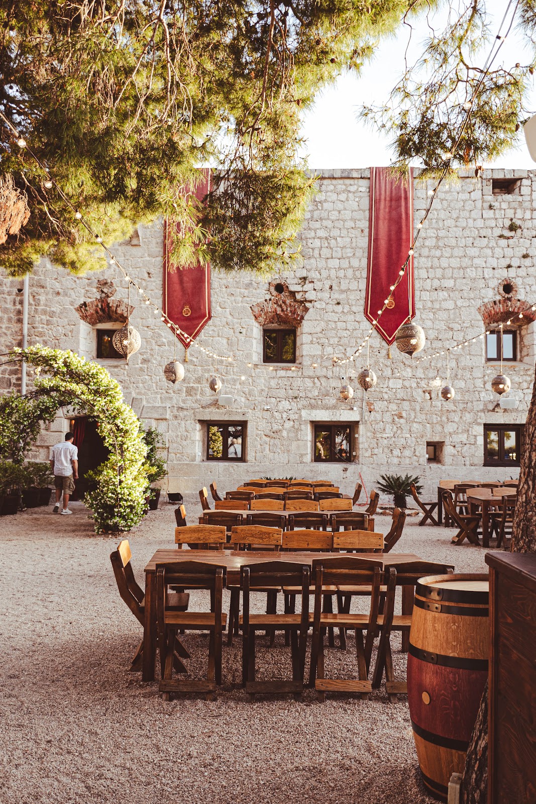 Fort George, Vis — restored 1811 British clifftop fortress with stone terraces, pine woods, and open-sea sunsets on Croatia's most remote major island (Mamma Mia 2), events to 200