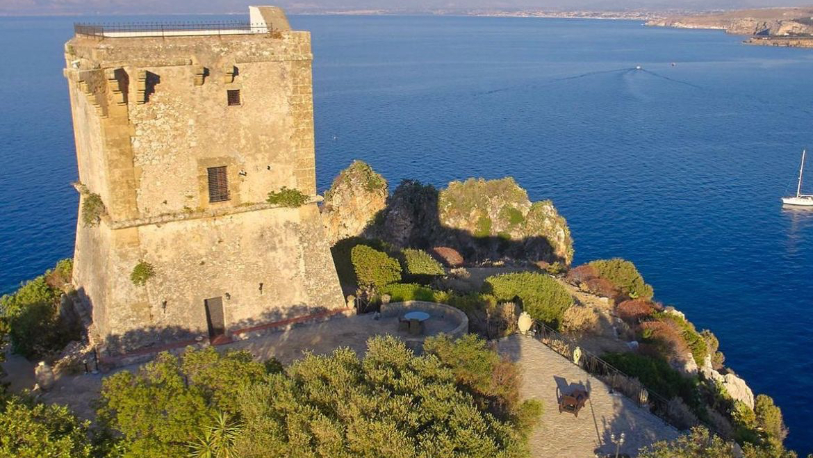 Torre di Scopello — 16th-century watchtower above the sea facing the Scopello Faraglioni, licensed for civil ceremonies