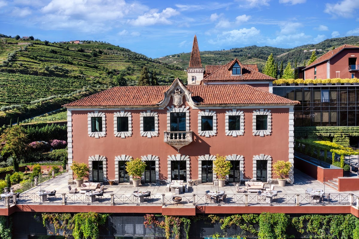 Six Senses Douro Valley — restored 19th-century manor wellness resort in UNESCO Douro vineyards, no-curfew Quinta Bar, capacity 200, ~90 minutes from Porto