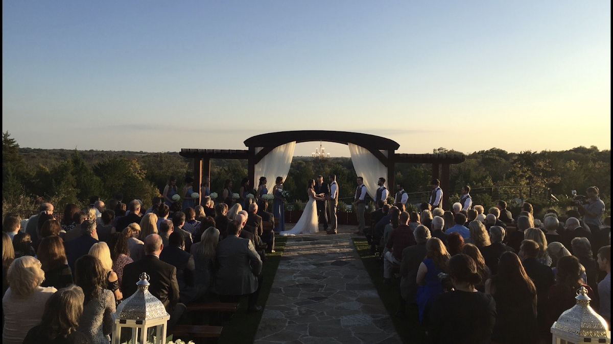 Stone Crest Venue, McKinney — guests watching an outdoor ceremony at sunset