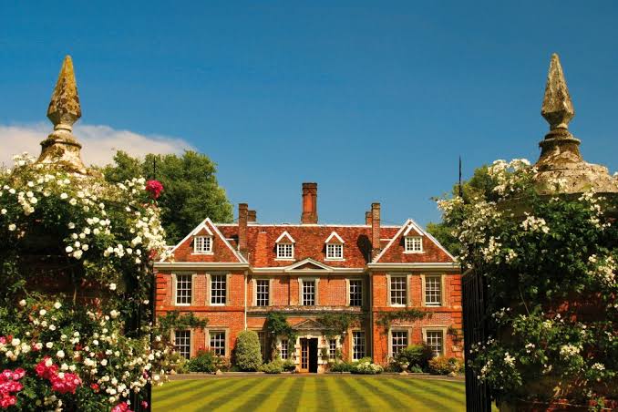 Lainston House, Winchester — the red-brick country house behind rose borders and striped lawns