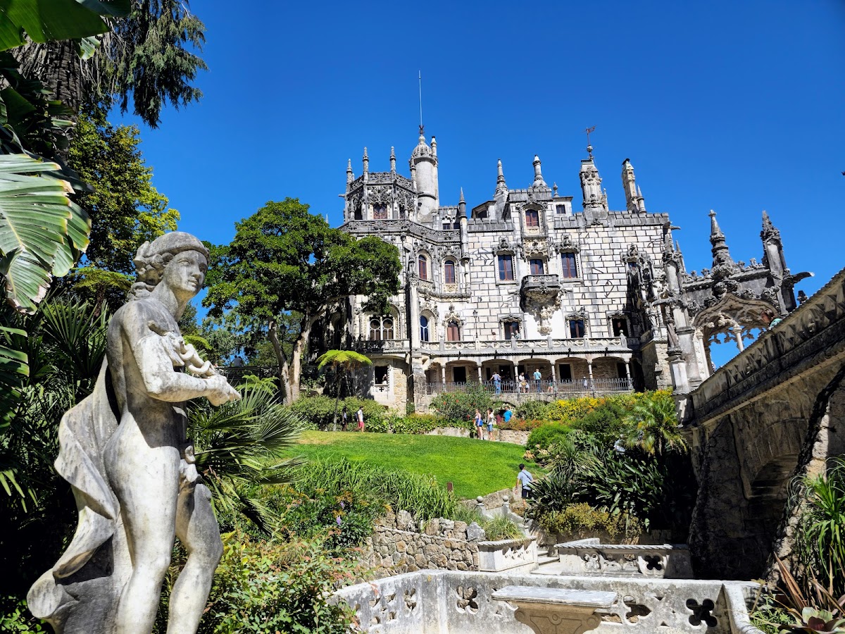 Quinta da Regaleira — mystical UNESCO World Heritage estate in Sintra with the famous Initiation Well, subterranean Gothic tunnels, lush exotic gardens, capacity 70
