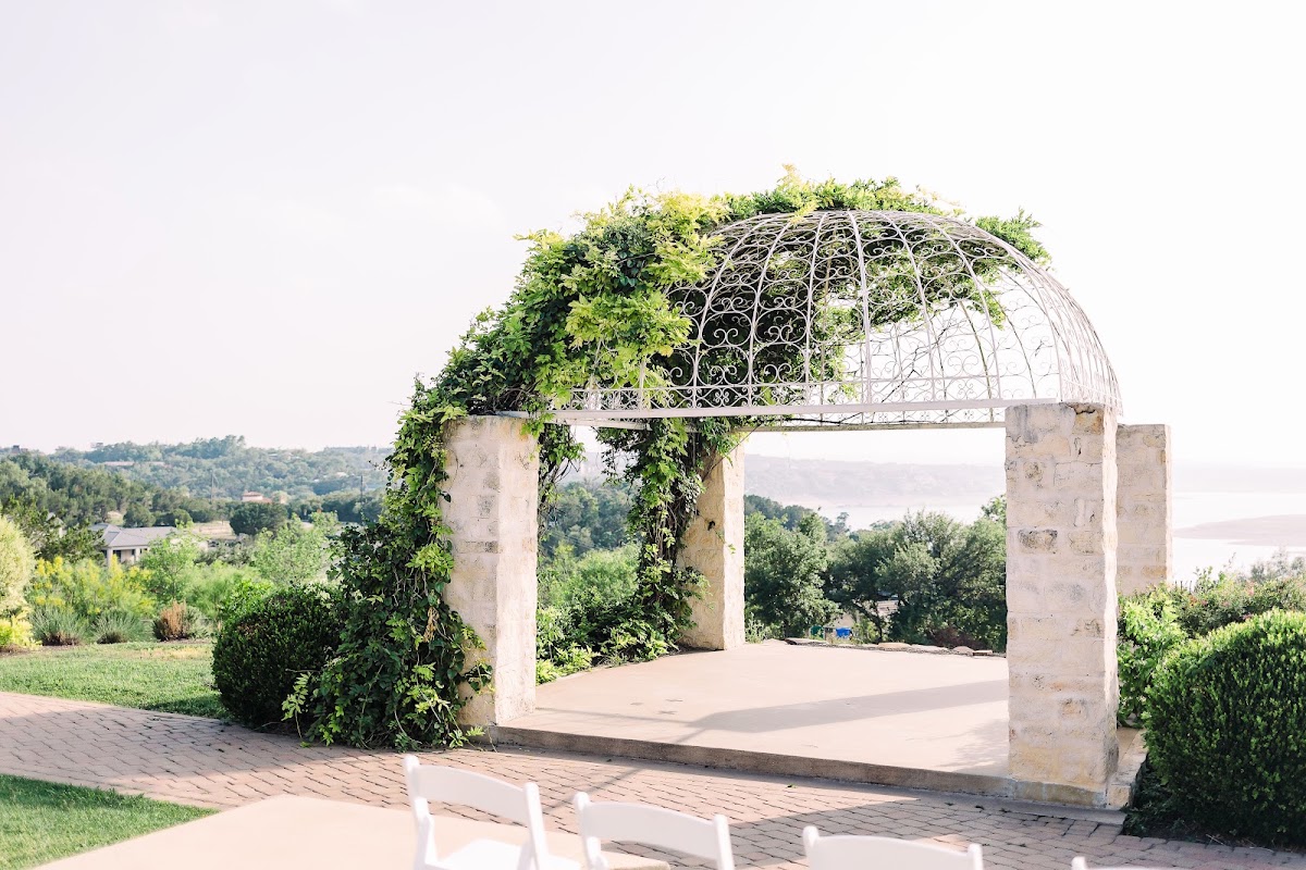 Vintage Villas, Lake Travis — the vine-covered ceremony gazebo above the lake