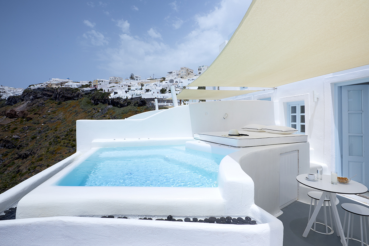 Dana Villas & Infinity Suites — caldera villa-hotel wedding venue in Firostefani, Santorini with volcano views and capacity for 80 guests