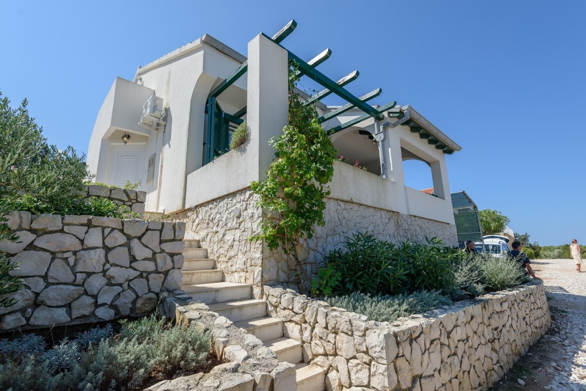 Veli Rat Lighthouse, Dugi Otok — 42-metre 1849 Adriatic lighthouse over pine woods and white-pebble coves, the definitive Croatian elopement venue for up to 30 guests