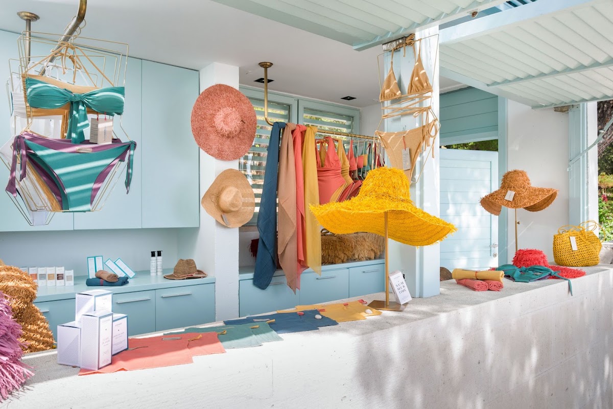 Beach Club Hvar — a 1927 retro-Mediterranean stone colonnade over the sea, one of Europe's hottest beach clubs, with seaside ceremonies and fine-dining receptions to 200 over the Pakleni sunset