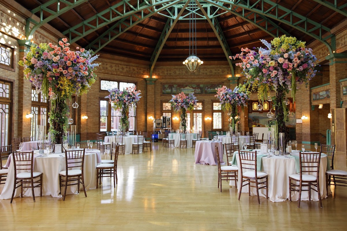 Café Brauer, Lincoln Park — the Great Hall set for a wedding reception under Prairie-style chandeliers
