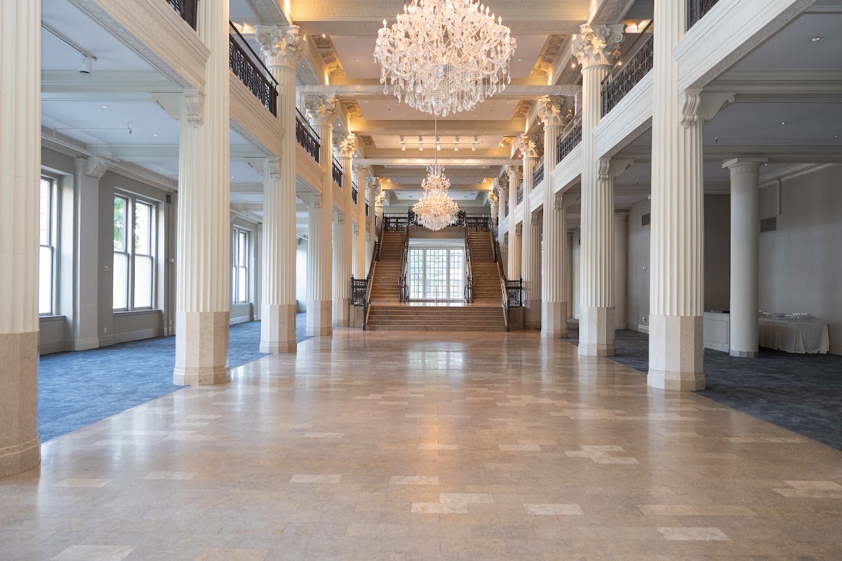 The Corinthian, Downtown Houston — the columned hall lit by crystal chandeliers