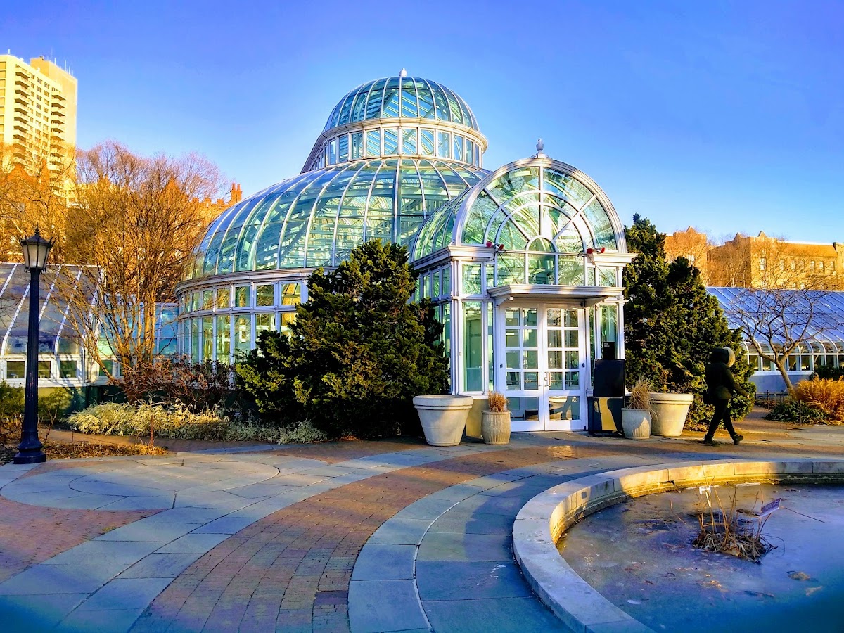 Brooklyn Botanic Garden — a glass conservatory and reflecting pool in autumn