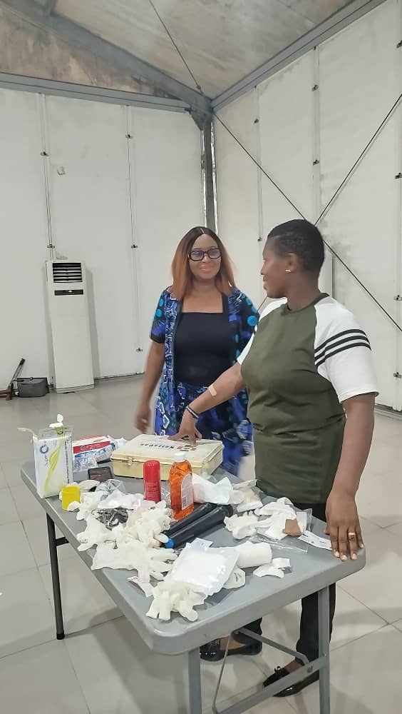 Reviewing emergency medical supplies during practical workshop