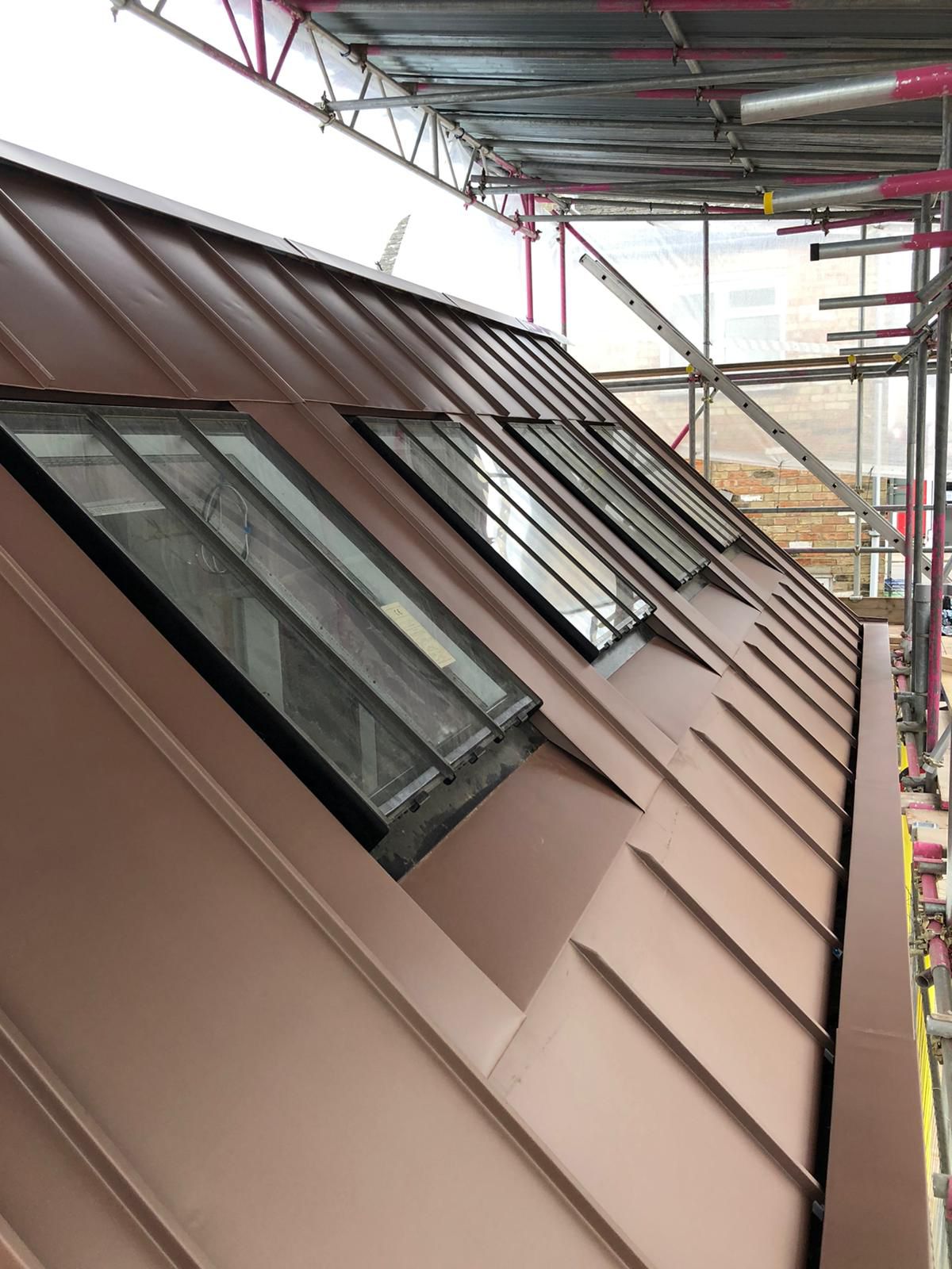 Close-up of a standing seam zinc roof