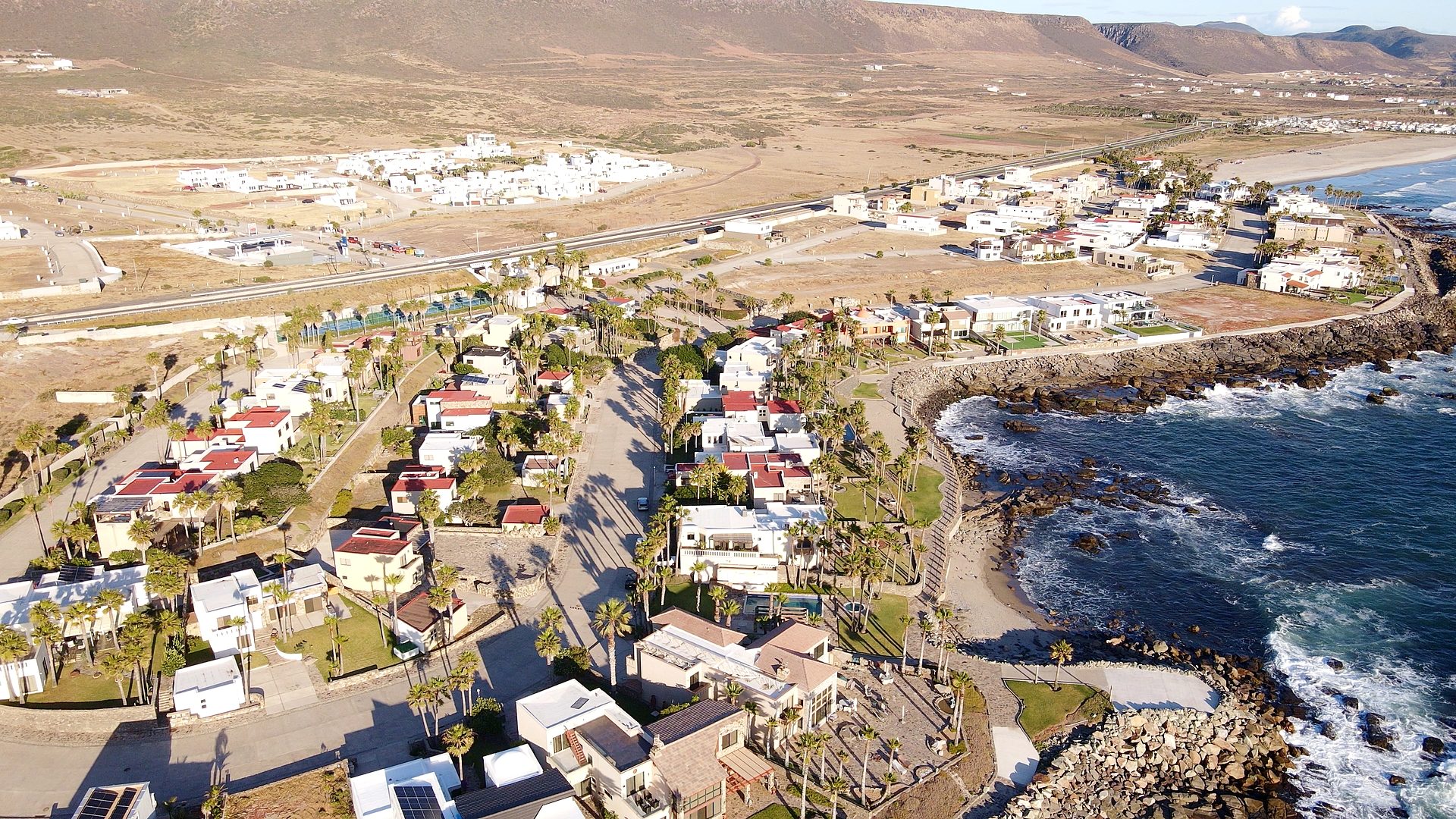 Modern coastal home with rooftop terrace and Pacific Ocean views in a Baja California gated community