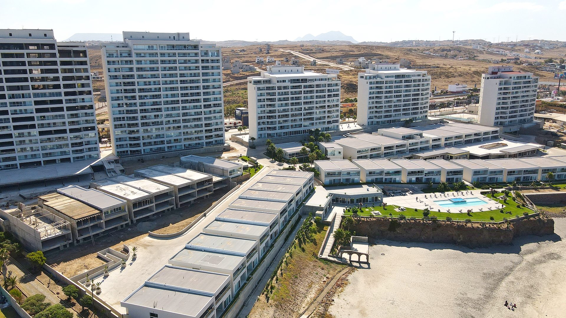Floor-to-ceiling ocean view living room in luxury condo Rosarito Beach Baja California