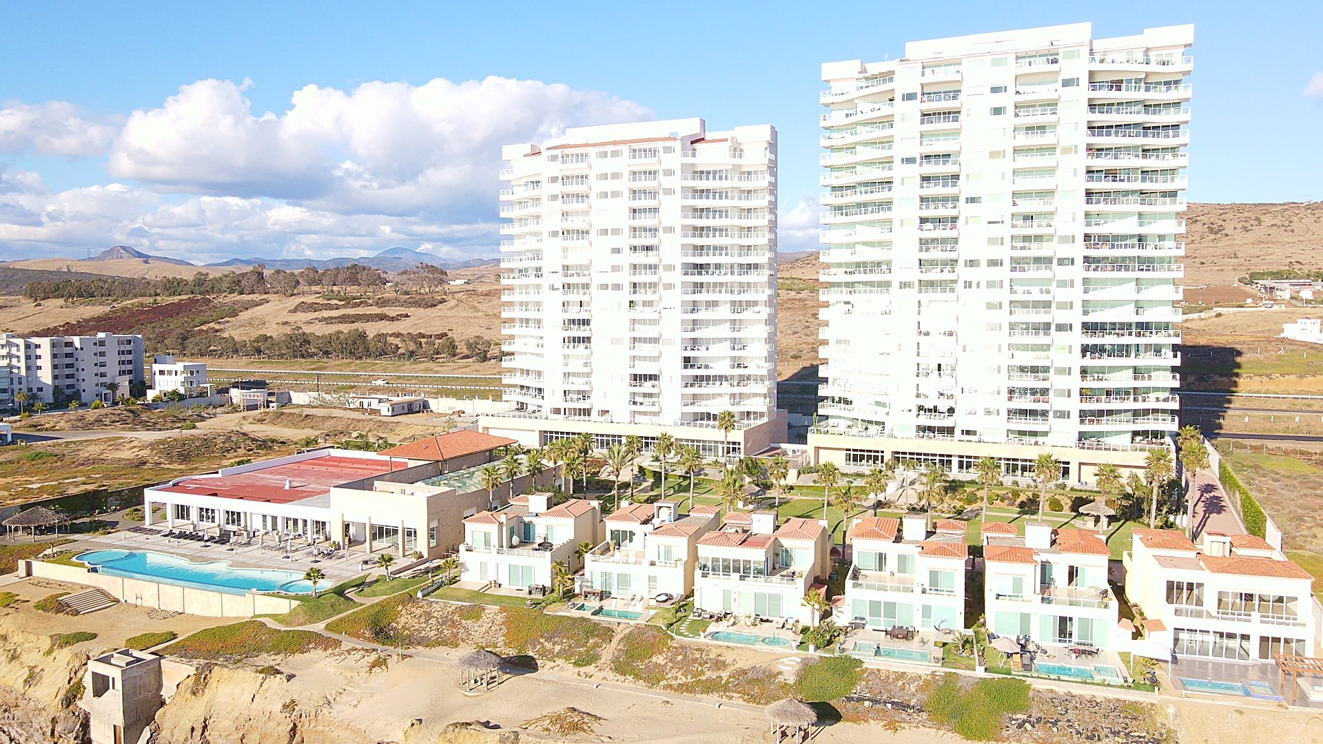 Resort pool deck at luxury gated oceanfront community Rosarito Beach Baja California
